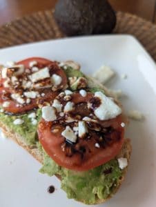 Avocado toast with feta cheese and tomato